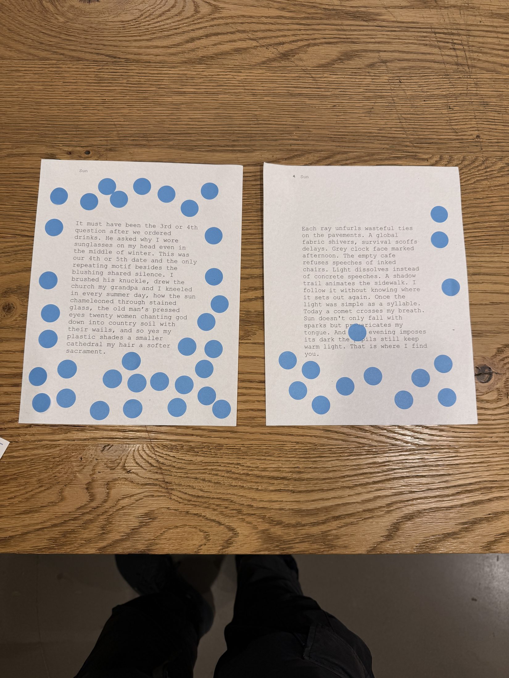 Printed poems covered in blue voting stickers