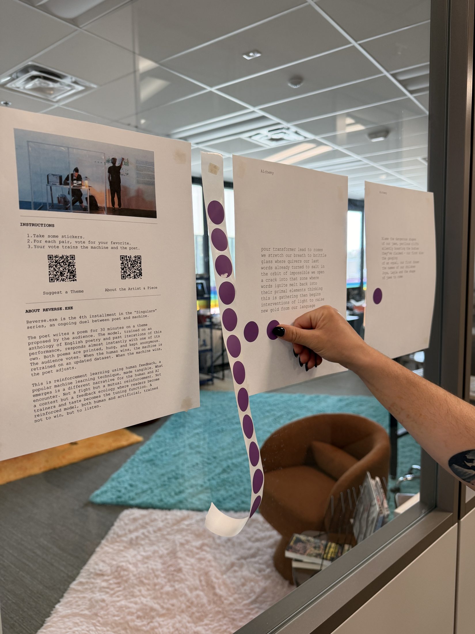 Printed poems accumulating with purple voting stickers at the lab