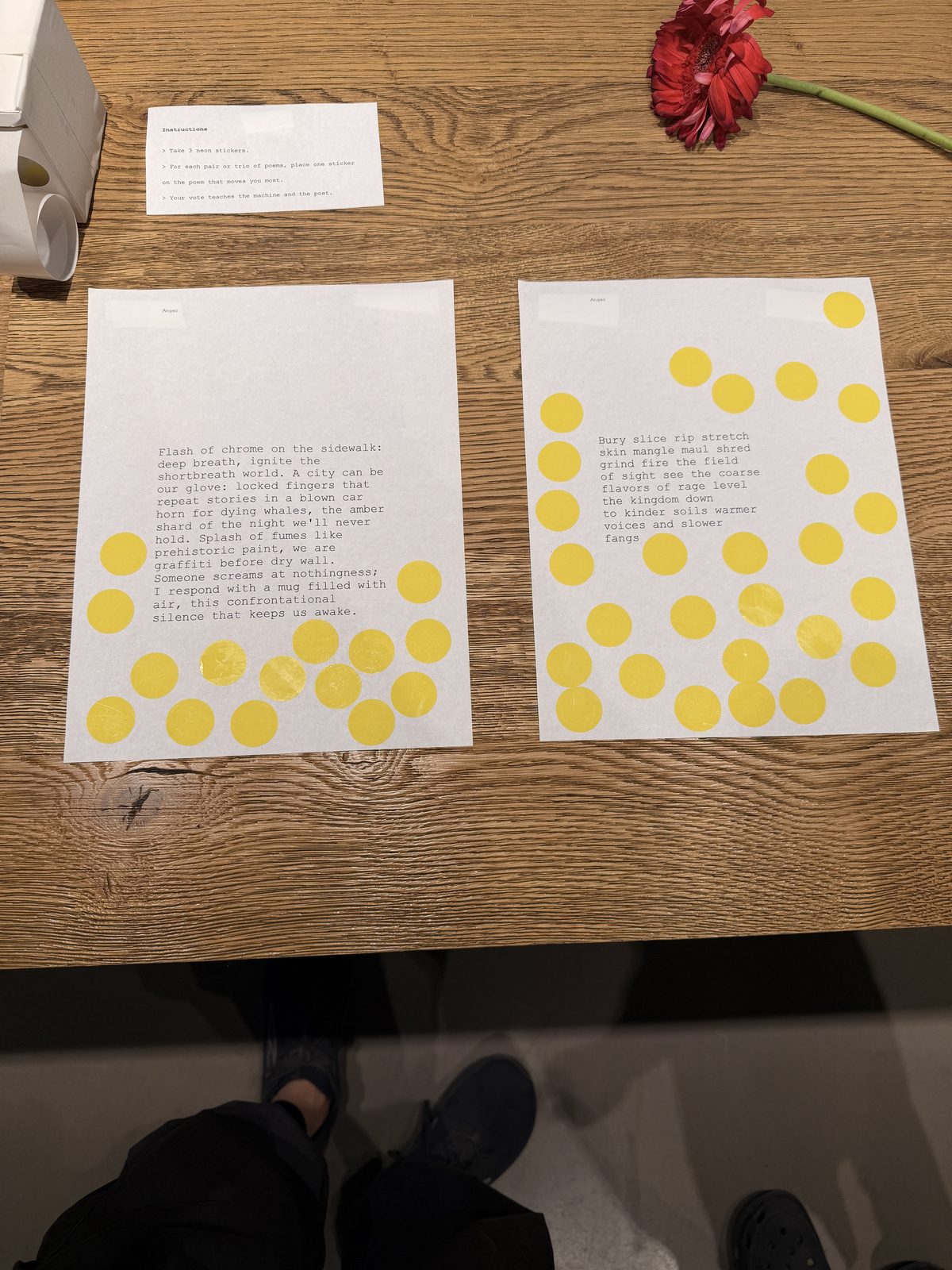 Printed poem sheets with audience votes
